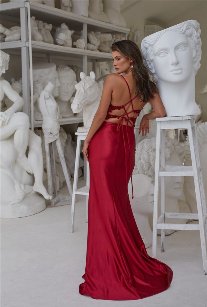 red fitted prom dress with strappy open back detail