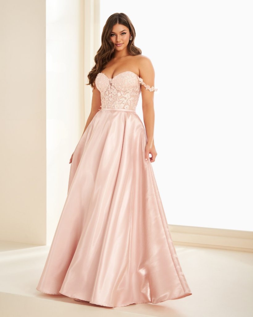 pink prom dress from City Prom with removable overskirt revieling a party dress underneath. Exclusive stockist of Ellie Wilde in South Wales